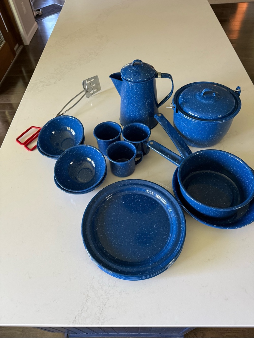 Classic Blue Speckled Enamel Cookware for camping, picnics, outdoor dinners.